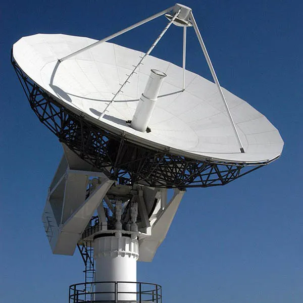 Satellite tracking dish against a clear sky
